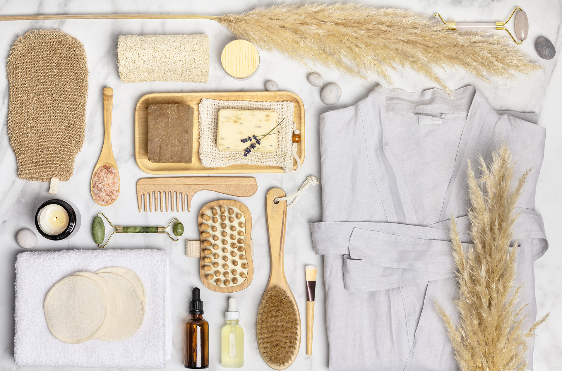 Signature branded hotel amenity collection in a luxury bathroom