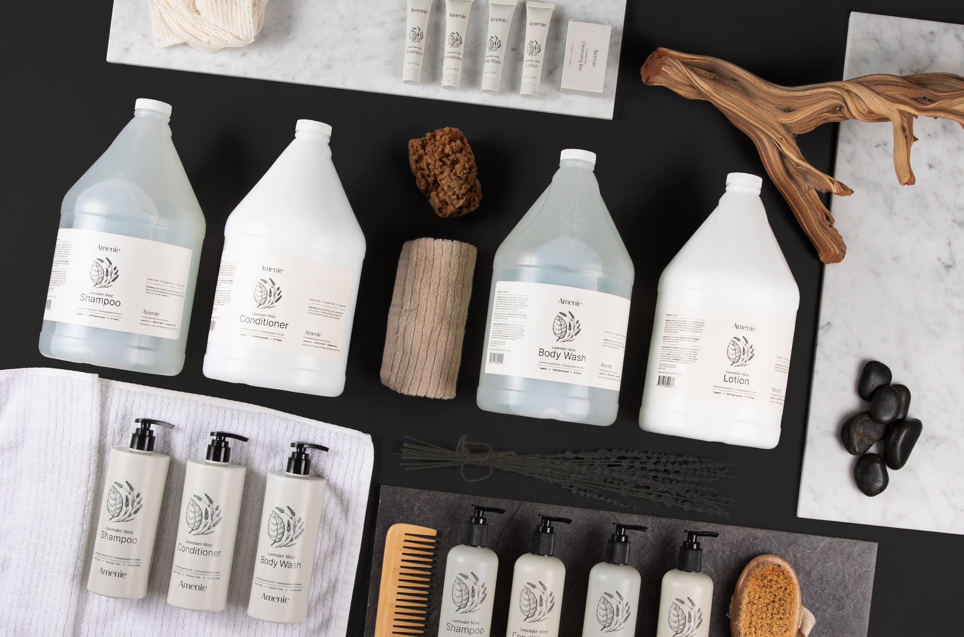 Refillable shampoo, conditioner, and body wash dispensers arranged neatly for a polished Airbnb bathroom